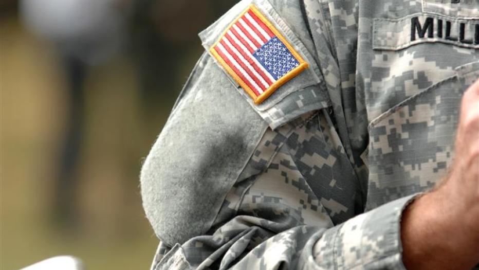 the American flag attached to the American military uniform.