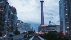Toronto cityscape at dusk with lit up buildings