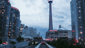 Toronto cityscape at dusk with lit up buildings 