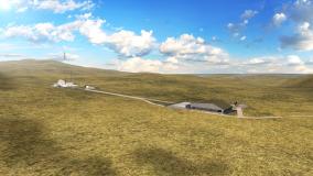 Small facility in the middle of a barren field in blue skies