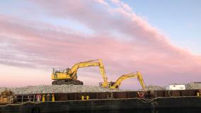 Construction crane in sunset