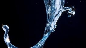 Stock image of water splash on a black background