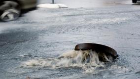 Stock image of overflowed sanitary sewer