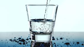 Water pouring into glass