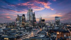 London skyline at dusk with purple sky