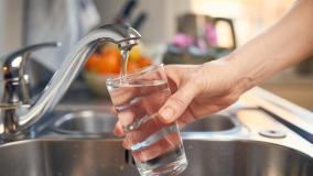 Filling up a glass of water