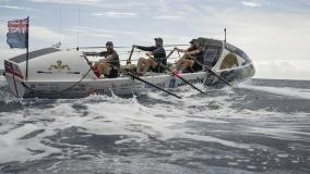 Crew rowing HMS Oardacious