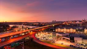 Highway interchange bridge at red dusk