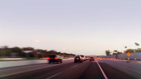 Highway traffic going north at dusk