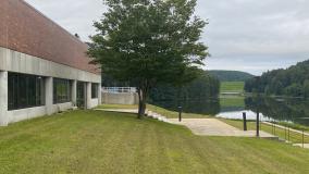 Municipal building front lawn with tree