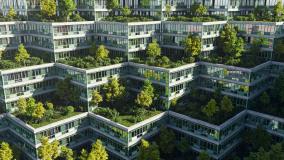 Aerial view of apartments with trees and green spaces