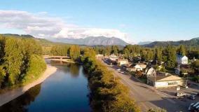 View of a river and mountain community of Fall City