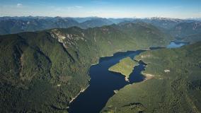 Stock aerial photo of the Coquitlam Lake Reservoir and mountains, Canada