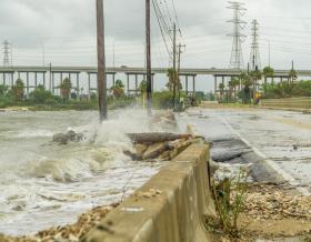 Water crashing over a road near Galveston Bay just outside of Houston Texas during Hurricane Harvey