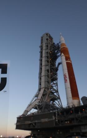 Jacobs sticker in front of Artemis I stack