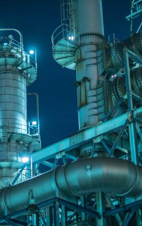 Details of large factory at night