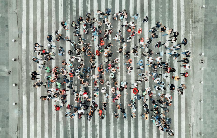 arial view of a thought bubble shaped from people standing in a group