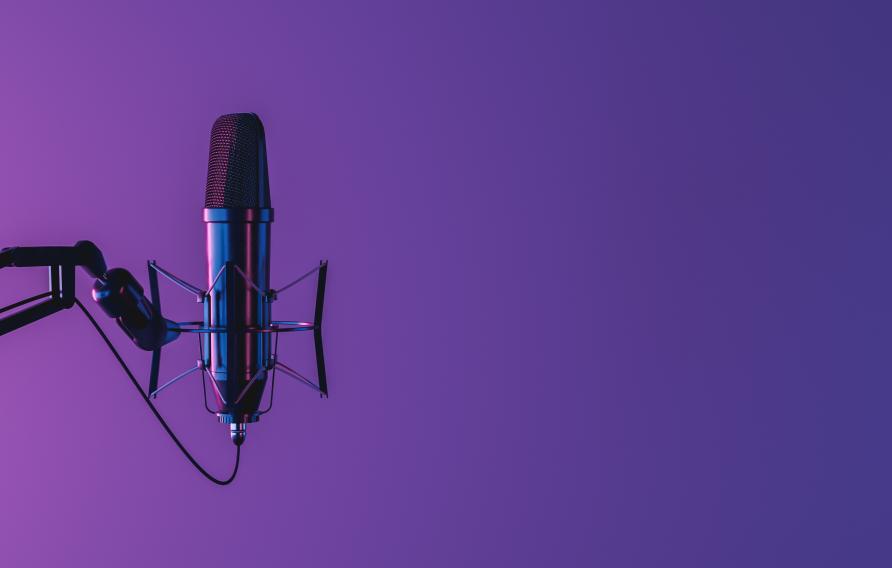 microphone in front of purple background