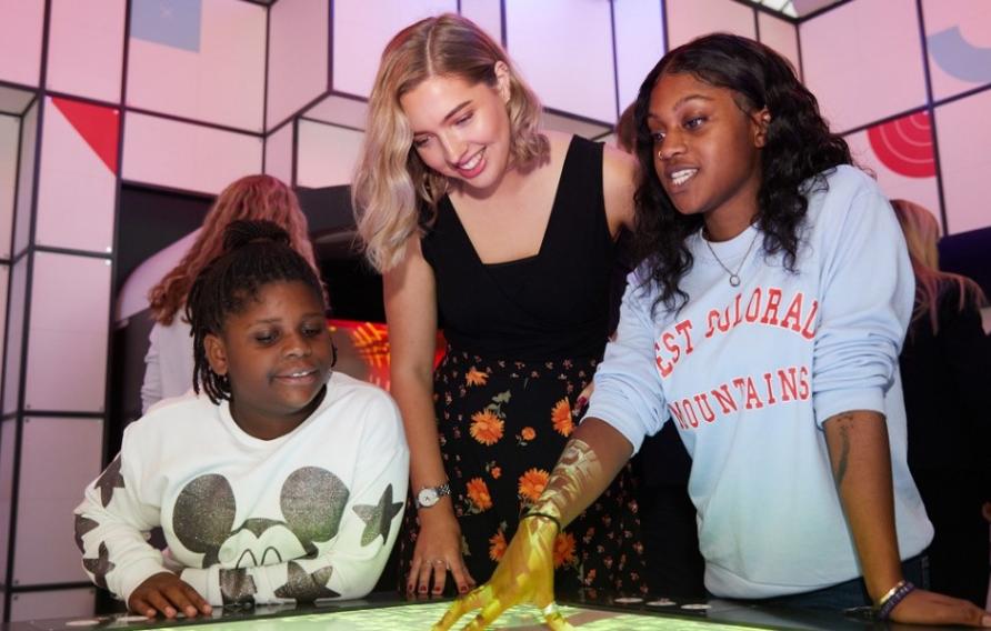 Lucy May and students at a STEAM event