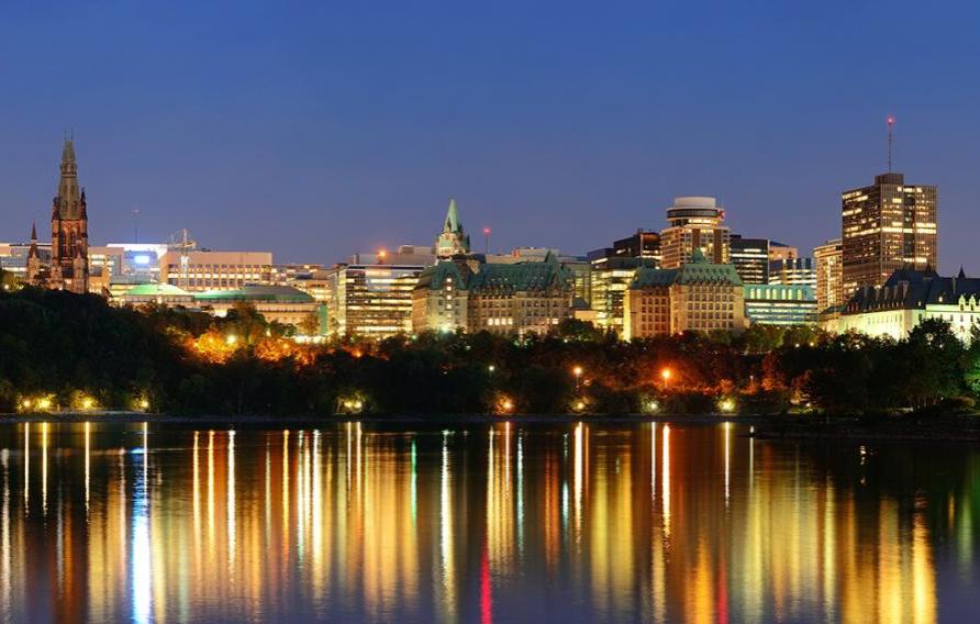 Ottawa downtown over water at night