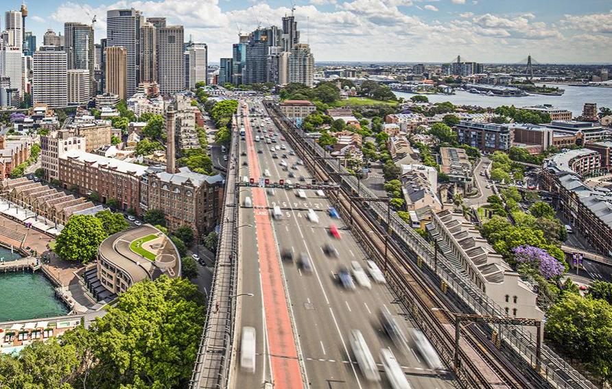 Sydney downtown traffic and aerial view of port and cityscape