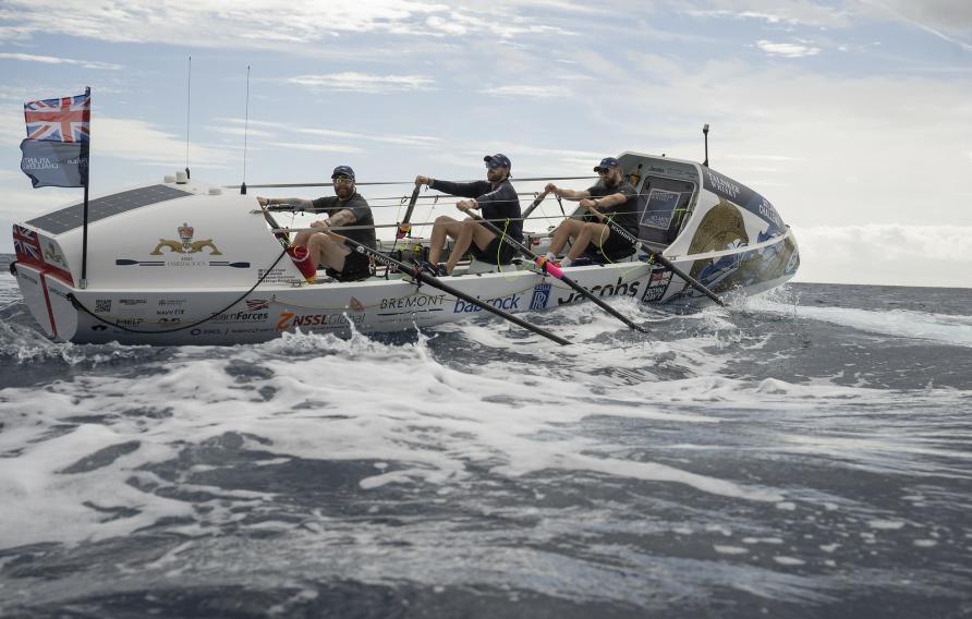 Crew rowing HMS Oardacious