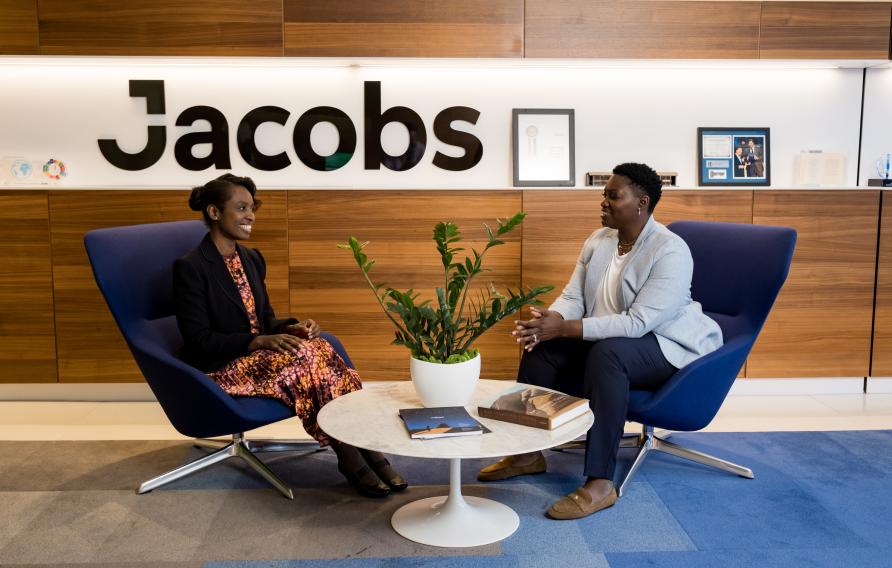 Jacobs office reception area two black women sitting