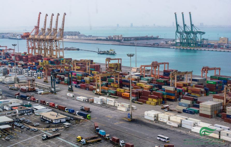 Aerial view of a container port with cranes
