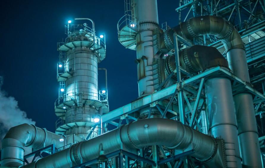 Details of large factory at night
