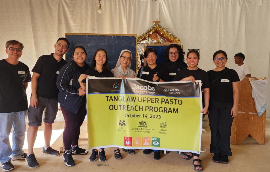 Philippines team with sign