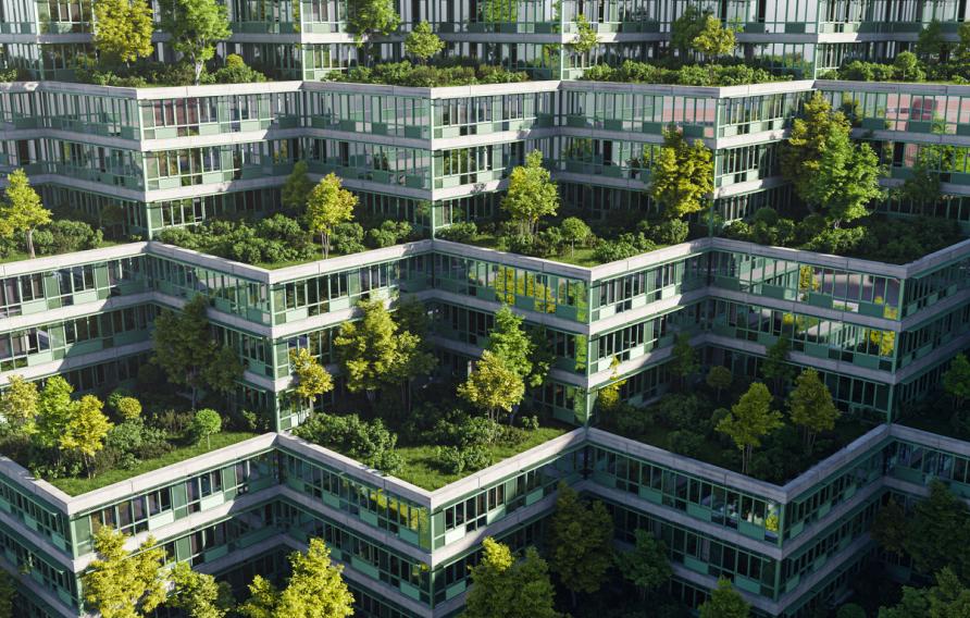 Aerial view of apartments with trees and green spaces
