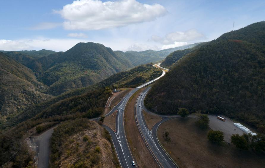 Aerial view of highway through the central mountain range in Puerto Rico.