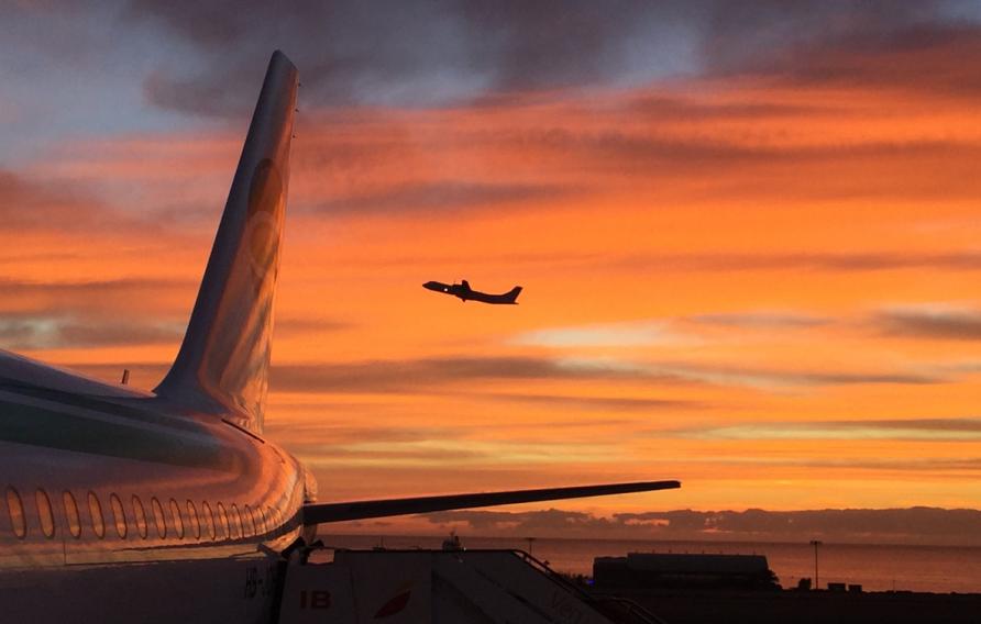 Planes in the sunset sky