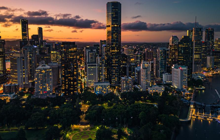 vibrant cityscape of Brisbane at dusk, viewed from an elevated perspective