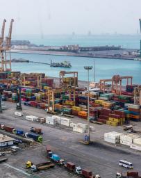Aerial view of a container port with cranes