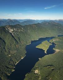 Stock aerial photo of the Coquitlam Lake Reservoir and mountains, Canada