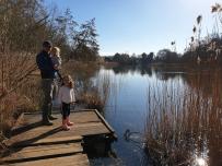 Neil Blazey with family by lake