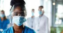 Stock image woman-physician-face-shield