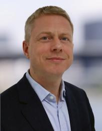 Dr. Iain Tromans