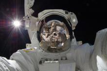 International Space Station astronaut with Jacobs HD camera designed for space