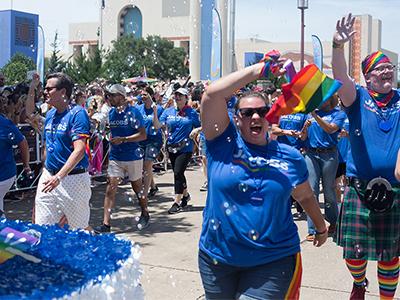 Jacobs employees cheering at Dallas Pride celebration