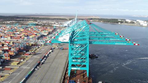 Bright blue cranes at Port of Virginia on the water