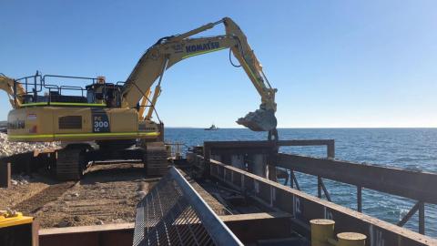 Excavator at work constructing new Windara reef