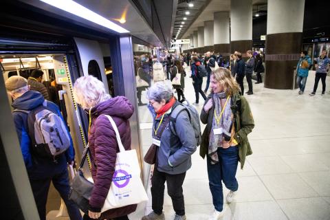 Elizabeth line passengers board train 