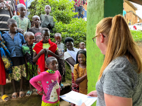 Ashley Betson meets with Rwandan children