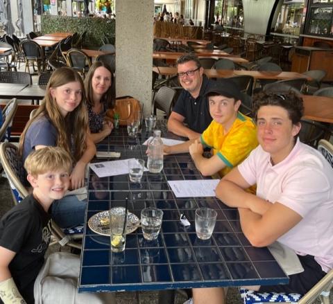 Julian Small and his family at a restaurant