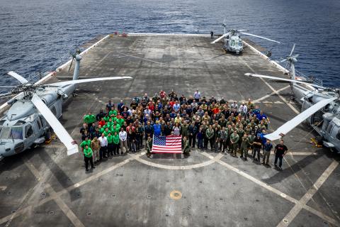 Members of NASA’s Landing and Recovery team and partners from the Department of Defense stand on the flight deck of USS John P. Murtha during Underway Recovery Test 10 (URT-10) off the coast of San Diego. URT-10 is the tenth in a series of Artemis recovery tests, but the first time NASA and its partners from the Department of Defense put their Artemis II recovery procedures to the test.