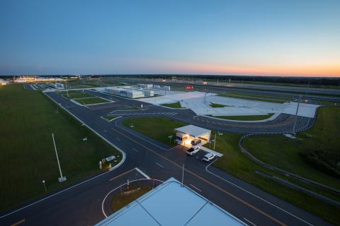 Night rendering of SunTrax advanced research and testing facility