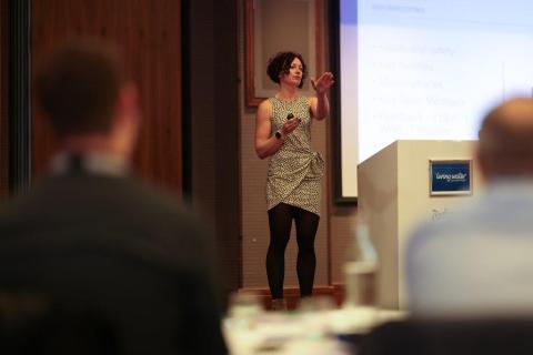 Jenny presenting at a conference