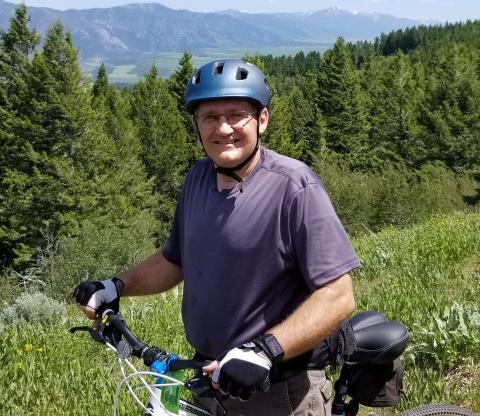 Loren as a volunteer parent coach for his boys’ mountain biking team practicing on a trail above Heise Hot Springs, Idaho